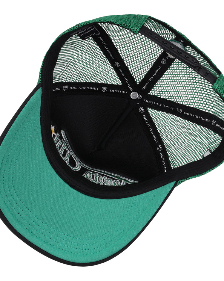 A top-down view inside a green and black Texas City Stars EFF Lone Star Foam Trucker hat shows the inner lining, mesh panels, and adjustable back strap. The EFF brand name appears on the black sweatband.
