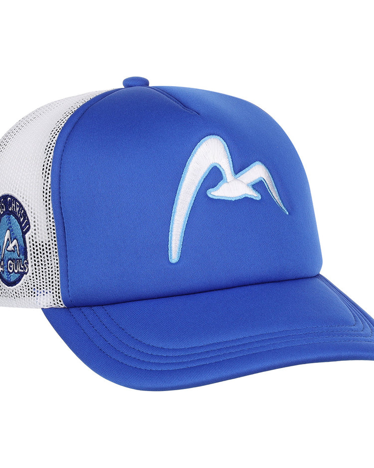 The EFF Corpus Christi Seagulls Lone Star Foam Trucker is a blue and white cap with a curved bill, featuring a white bird logo on the front and a Seagulls patch on the left mesh side.