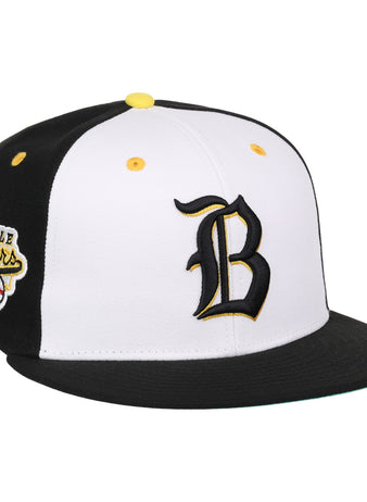 The EFF Beeville Blazers Lone Star Fitted Ballcap features black and white colors, a bold black B on the front, yellow top button, and an embroidered bee patch—ideal for any Lone Star League fan.