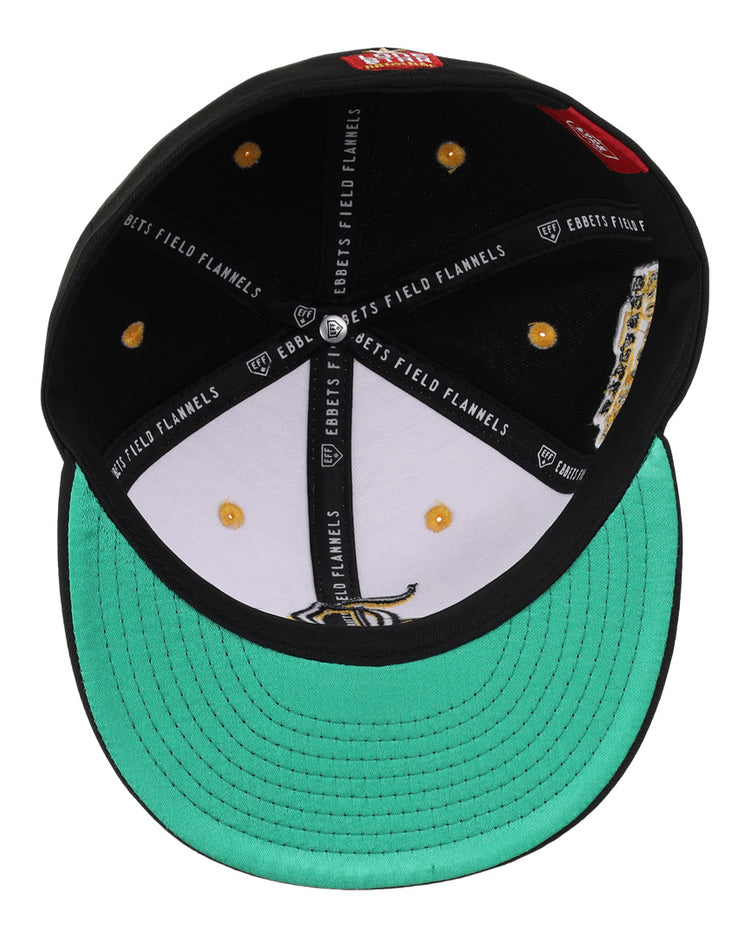 The Beeville Blazers EFF Lone Star Fitted Ballcap features a black crown with gold rivets, white branding, and a bright green underbrim. Inside, the sweatband has Ebbets Field Flannels and Lone Star League embroidered logos.