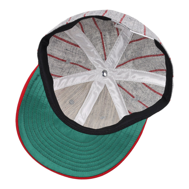 The image displays the inside of the Ebbets Field Flannels Bilikens Cigarros 1921 Vintage Ballcap, inspired by the Cuban Amateur League, featuring a grey crown, red stripes, black edge, green underbrim, and white star-stitched strips.