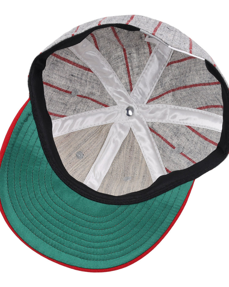 The image displays the inside of the Ebbets Field Flannels Bilikens Cigarros 1921 Vintage Ballcap, inspired by the Cuban Amateur League, featuring a grey crown, red stripes, black edge, green underbrim, and white star-stitched strips.