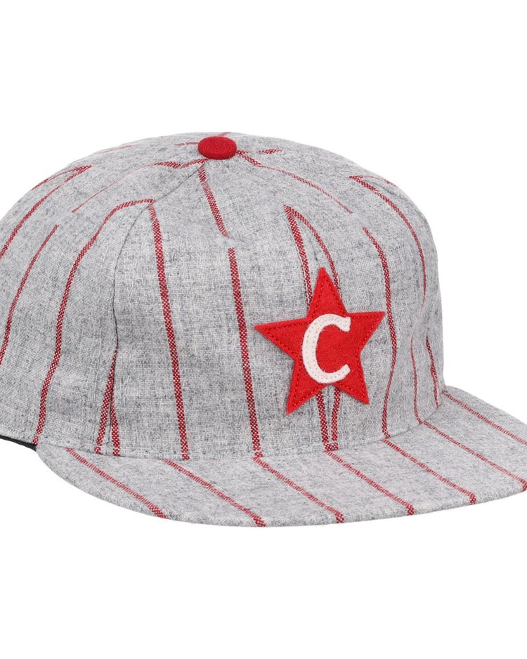 The Cienfuegos Stars 1940 Vintage Ballcap by Ebbets Field Flannels features gray fabric, red pinstripes, a red star patch with a white C, and a red top button—authentic details inspired by the original Cuban Amateur League design.