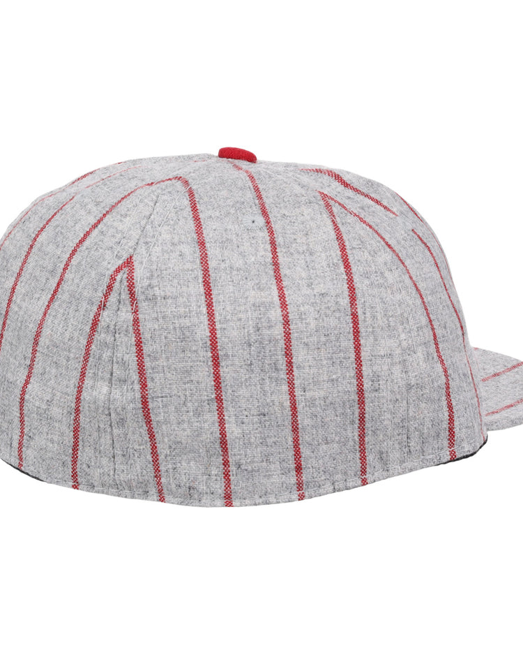 The Ebbets Field Flannels Cienfuegos Stars 1940 Vintage Ballcap is a light gray cap with vertical red pinstripes, a flat brim, and a red top button, inspired by the Cuban Amateur Leagues historic design.