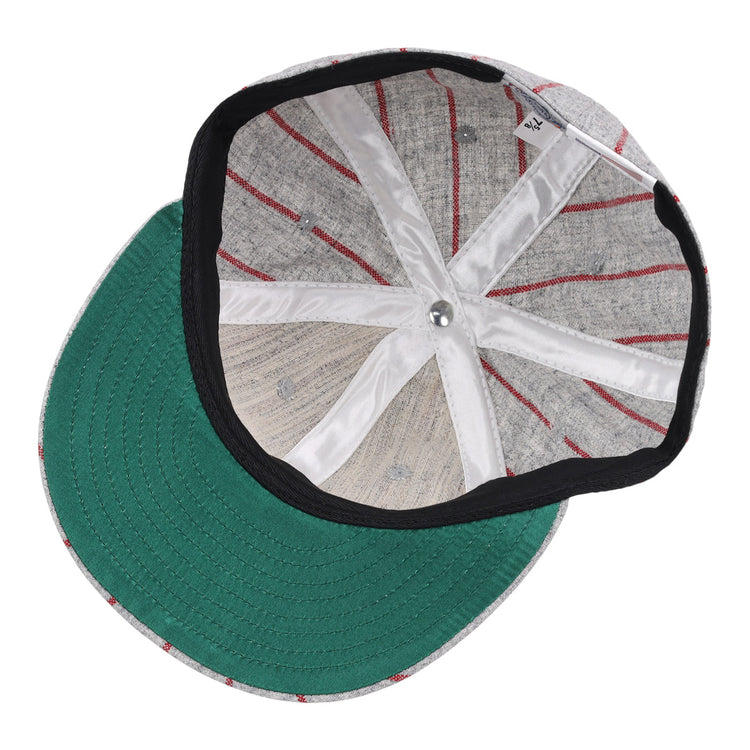 A top-down view of the Ebbets Field Flannels Cienfuegos Stars 1940 Vintage Ballcap shows gray fabric with red stitching, a green underbrim, and white satin lining—mirroring the classic Cuban Amateur League style.