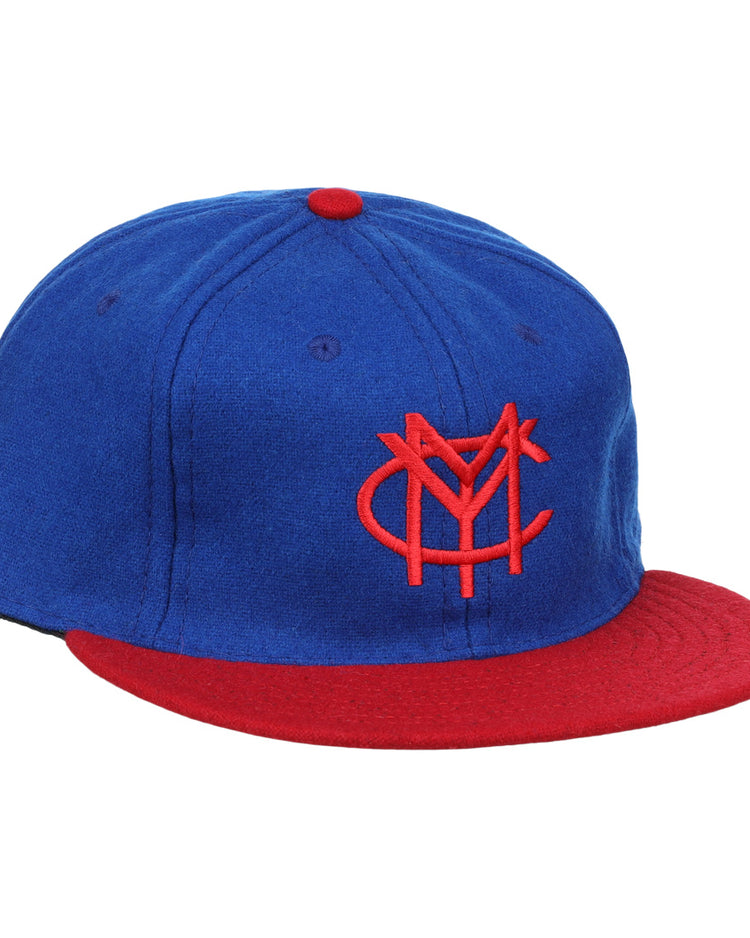 The Miramar Yacht Club 1952 Vintage Ballcap by Ebbets Field Flannels is a blue and red wool cap featuring a red interlocking NY logo on the front, a red brim, and a matching top button.