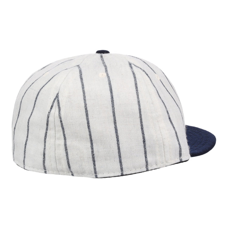 The Ebbets Field Flannels Vedado TC 1930 Vintage Ballcap features thin vertical navy stripes and a solid navy brim, inspired by the classic design, and is shown from back and side angles.