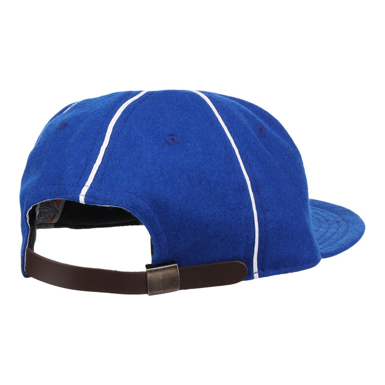The Almendares Alacranes 1931 Vintage Ballcap by Ebbets Field Flannels is a blue Cuban League cap with white stripes, seen from the back, and features an adjustable brown leather strap with metal buckle.