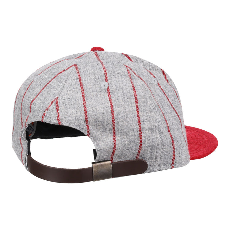 The Ebbets Field Flannels Bilikens Cigarros 1921 Vintage Ballcap features gray fabric, red stripes, a red brim, and an adjustable brown leather strap with metal buckle—evoking the classic Cuban Amateur League style.