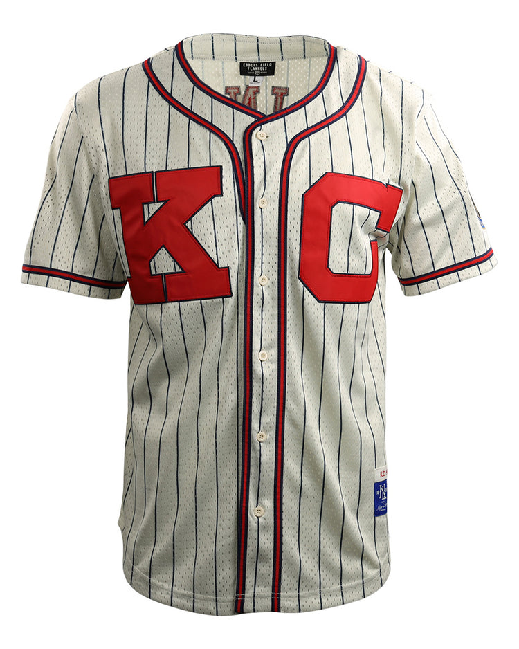 The EFF Jackie Robinson Kansas City Monarchs Vintage Inspired NL Replica Button-Up Mesh Jersey features a white mesh build, short sleeves, thin navy stripes, red trim, and bold red KC lettering—honoring classic Negro National League style.
