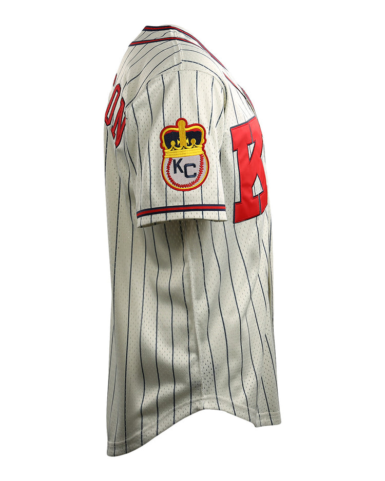The EFF Jackie Robinson Kansas City Monarchs Vintage Inspired NL Replica Button-Up Mesh Jersey features white pinstripes, bold red front lettering, and a sleeve patch with a crown and KC.