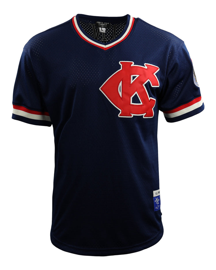 The EFF Jackie Robinson Kansas City Monarchs Vintage Inspired NL Replica V-Neck Mesh Jersey features navy blue mesh, red and white trim, a large interlocking KC chest logo, and left sleeve patch, inspired by classic Ebbets Field Flannels.