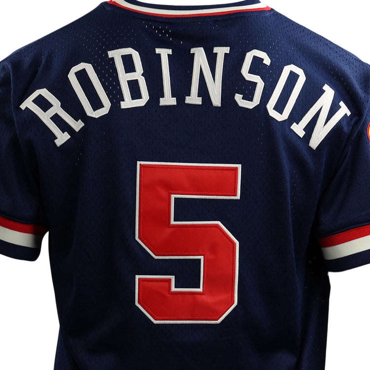The EFF Jackie Robinson Kansas City Monarchs Vintage Inspired NL Replica V-Neck Mesh Jersey features navy mesh with white trim, “ROBINSON” in white on the back, and bold red and white number 5, inspired by classic designs.