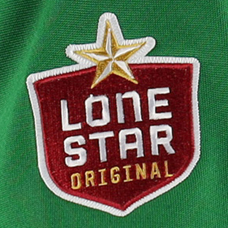 The Texas City Stars EFF Lone Star Baseball Jersey by EFF features a red and white patch with a gold star reading Lone Star Original on green fabric, celebrating the spirit of the legendary Texas City Stars.