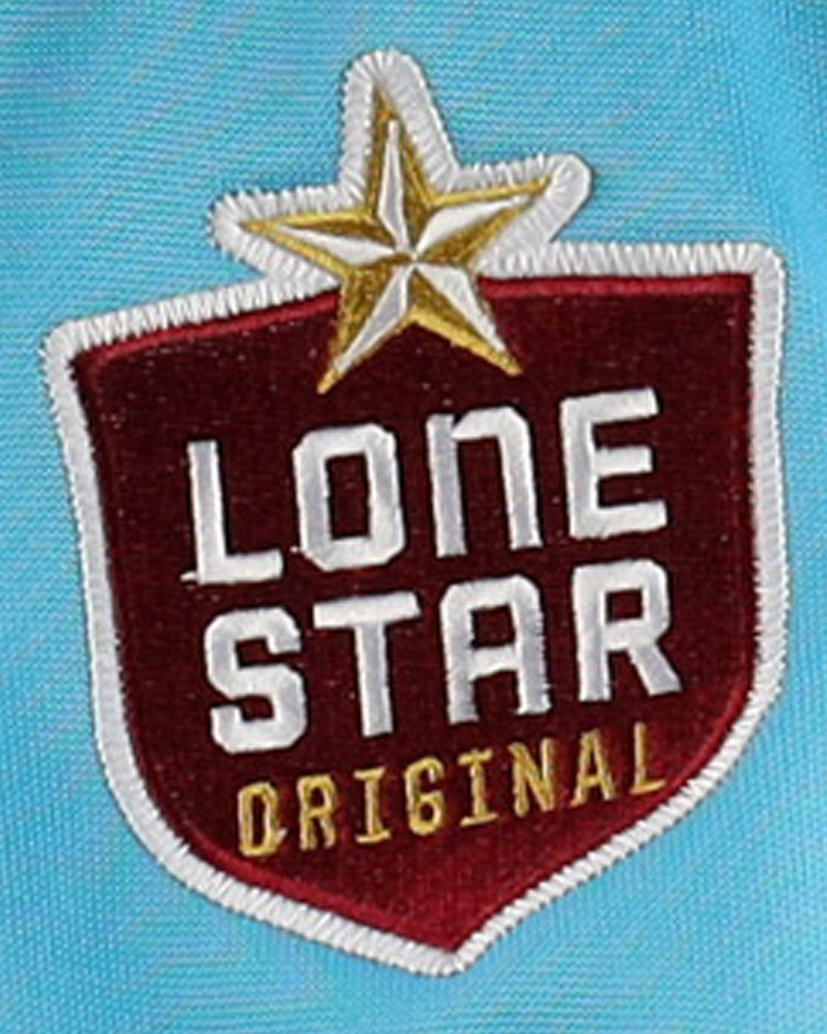 The EFF Corpus Christi Seagulls Lone Star Baseball Jersey features a red shield patch with a gold star, white LONE STAR text, and yellow ORIGINAL, all set on light blue fabric to honor the Lone Star League team.