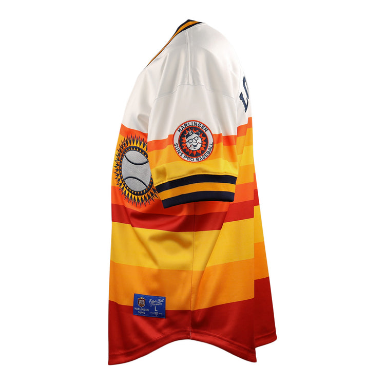 The EFF Harlingen Suns EFF Lone Star Baseball Jersey features bold yellow, orange, and red stripes with white shoulders and sleeves, plus sleeve patches of a baseball and the Harlingen Suns team logo from the Lone Star League.