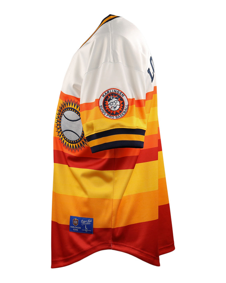 The EFF Harlingen Suns EFF Lone Star Baseball Jersey features bold yellow, orange, and red stripes with white shoulders and sleeves, plus sleeve patches of a baseball and the Harlingen Suns team logo from the Lone Star League.