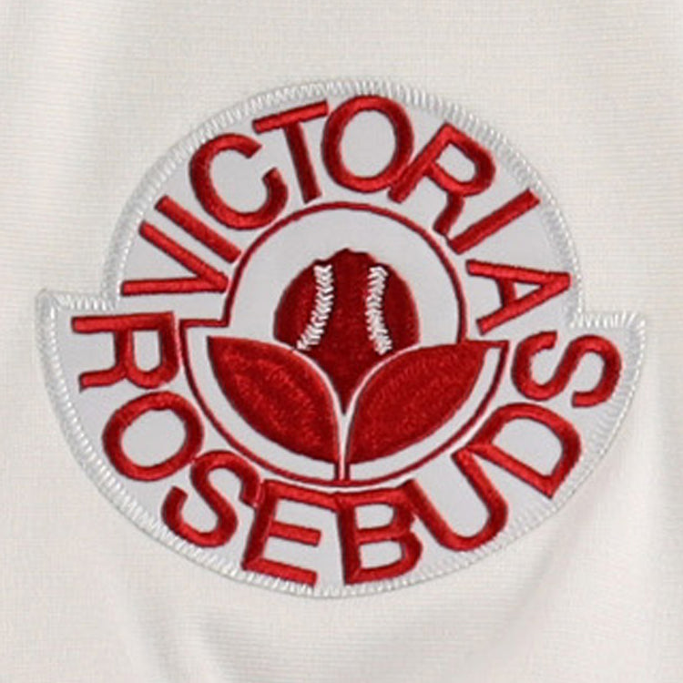 A white embroidered patch with red text Victoria Rosebuds encircles a red rosebud on the EFF Lone Star Baseball Jersey—a perfect keepsake for North Division and Lone Star League fans.