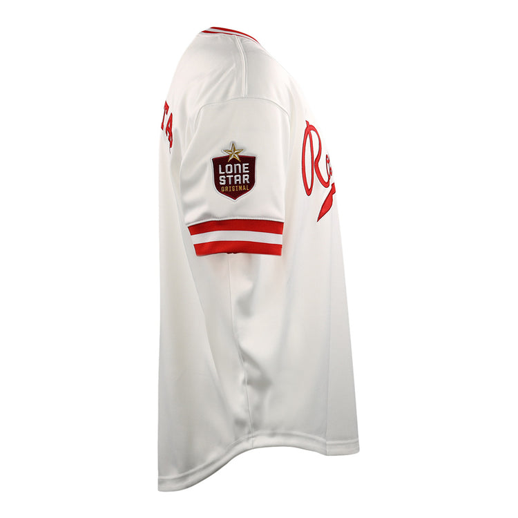 The EFF Victoria Rosebuds Lone Star Baseball Jersey is white with red trim, a Lone Star patch on the left sleeve, and red Re lettering on the chest. This side-view jersey represents the Victoria Rosebuds of the Lone Star League North Division.