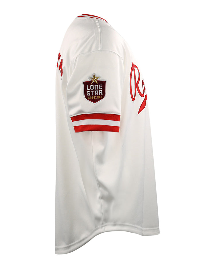 The EFF Victoria Rosebuds Lone Star Baseball Jersey is white with red trim, a Lone Star patch on the left sleeve, and red Re lettering on the chest. This side-view jersey represents the Victoria Rosebuds of the Lone Star League North Division.