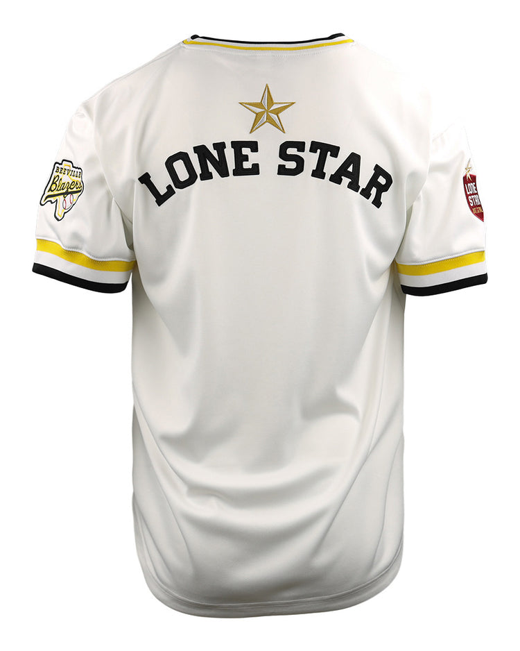 The EFF Beeville Blazers Lone Star Baseball Jersey is white with yellow and black trim, LONE STAR in bold black letters, a gold star on the back, and sleeve patches inspired by Joe Hunter Field in Corpus Christi.
