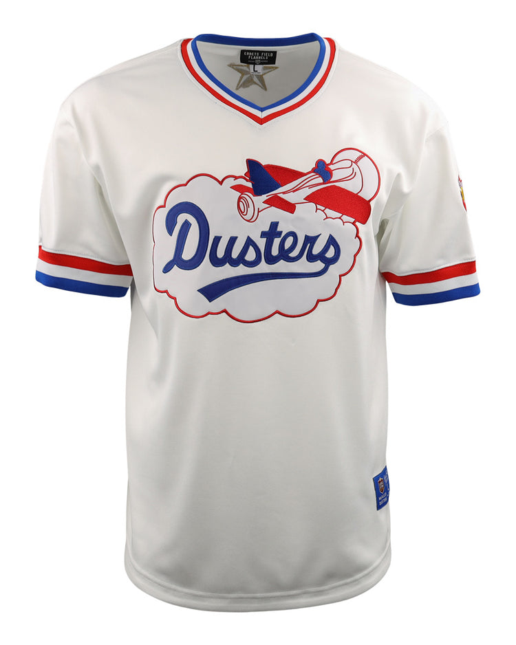 Show your McAllen Dusters pride on the field with the EFF McAllen Dusters EFF Lone Star Baseball Jersey, featuring white fabric, red and blue trim, Dusters in blue script in a cloud, and a red airplane design above the text.