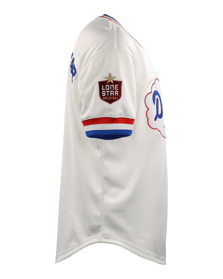 Side view of the McAllen Dusters EFF Lone Star Baseball Jersey by EFF in white, featuring red and blue trim, a Lone Star patch on the sleeve, and a partial blue script logo on the chest.