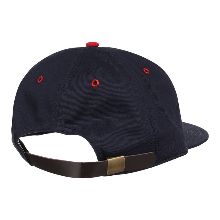 The EFF Columbus Red Birds Cotton Twill Ballcap is a navy blue cotton twill cap with red eyelets, a red top button, and an adjustable strap with a brass-colored clasp, seen from the back. Ideal for fans of classic cotton ballcaps.