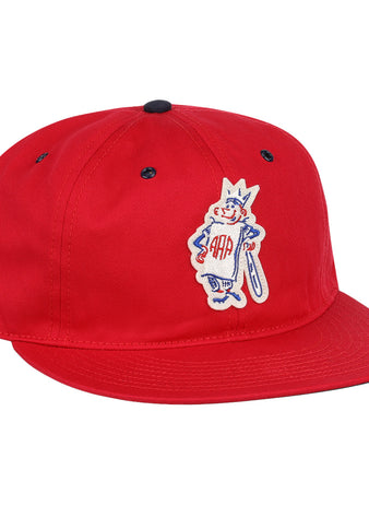 The Havana Sugar Kings Cotton Twill Ballcap by EFF is a red cotton cap with a flat brim, cartoon character embroidery—crowned, bat in hand, “AAA” on the chest—and a Beisbolito patch inspired by the Cuban League.