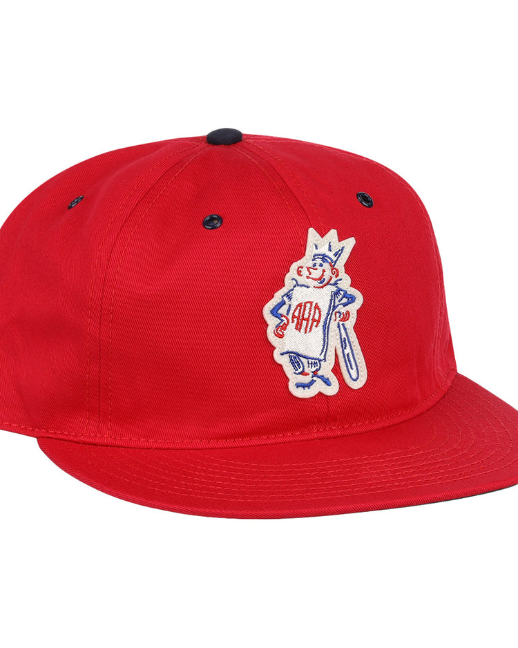 The Havana Sugar Kings Cotton Twill Ballcap by EFF is a red cotton cap with a flat brim, cartoon character embroidery—crowned, bat in hand, “AAA” on the chest—and a Beisbolito patch inspired by the Cuban League.