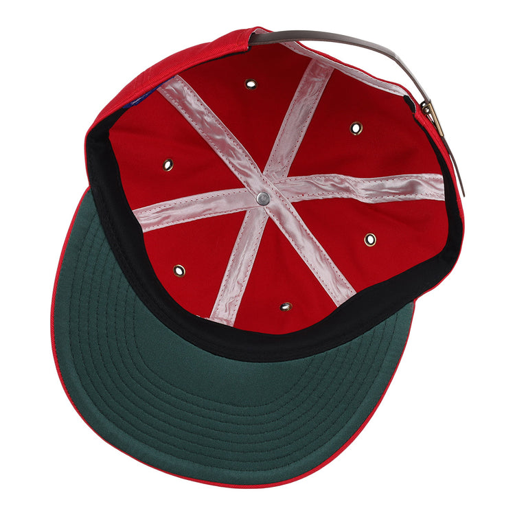 Inside view of the EFF Havana Sugar Kings Cotton Twill Ballcap: red cotton, Cuban League-inspired, white crisscross bands, metal rivets, green underbill, and adjustable back strap.