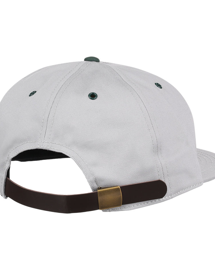 The EFF Magallanes Navigators Cotton Twill Ballcap is shown from the back, featuring a brown adjustable strap with a brass buckle and green embroidered eyelets—ideal for Venezuelan baseball fans.