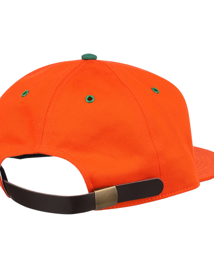 The EFF Miami Beach Flamingos Cotton Twill Ballcap features green eyelets, a black adjustable leather strap with a brass clasp, and a playful flamingos patch, all on orange cotton twill viewed from the back.