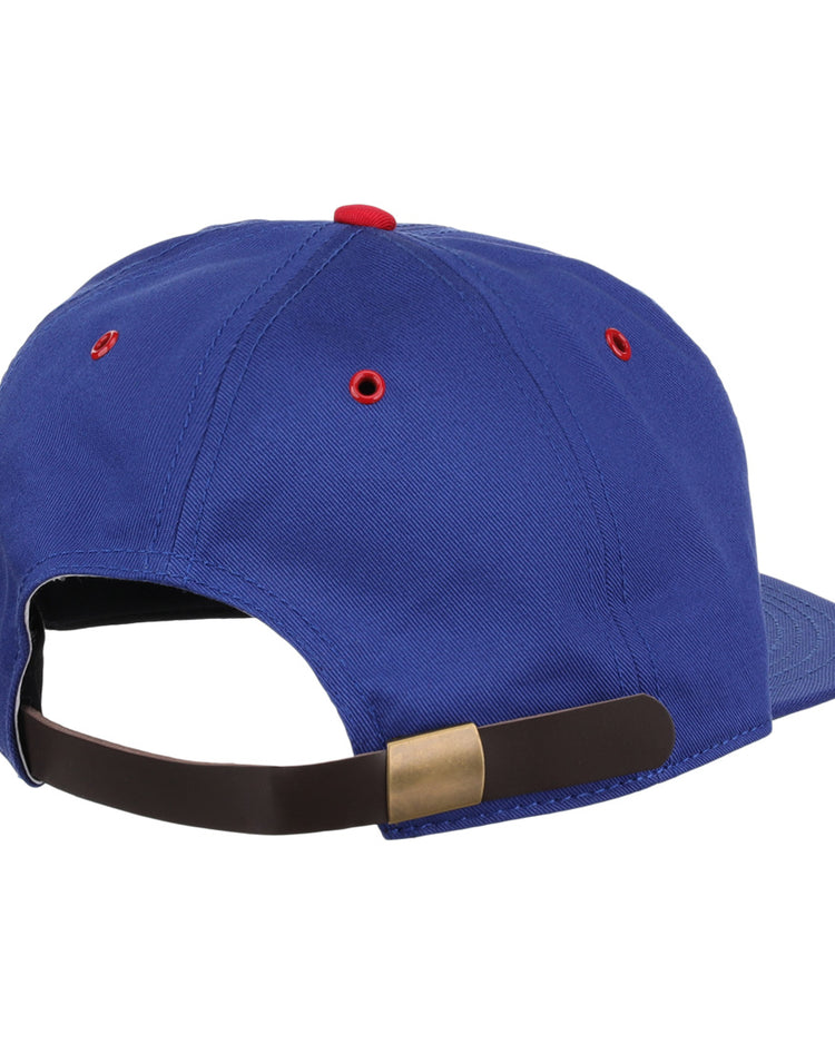 The EFF Montreal Royals Cotton Twill Ballcap is blue cotton, shown from the back with a brown adjustable strap and brass buckle, red embroidered eyelets, and a stylish Royals patch for extra flair.