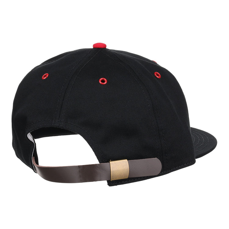 The EFF Memphis Red Sox Cotton Twill Ballcap features black cotton, red eyelets, and a brown adjustable strap with a brass buckle, inspired by the Negro American League team; shown from the back.