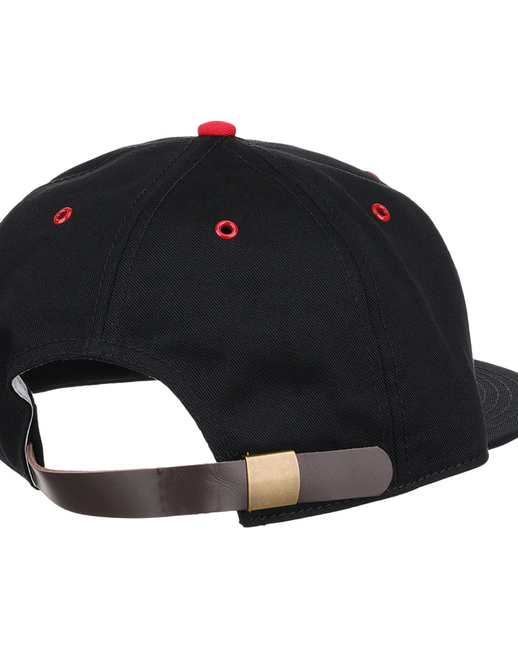 The EFF Memphis Red Sox Cotton Twill Ballcap features black cotton, red eyelets, and a brown adjustable strap with a brass buckle, inspired by the Negro American League team; shown from the back.