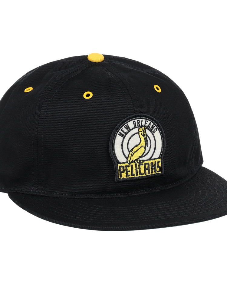 The EFF New Orleans Pelicans Cotton Twill Ballcap is a black cap with yellow accents, a Pelicans patch on the front, and New Orleans Pelicans text—ideal for Southern Association baseball fans.