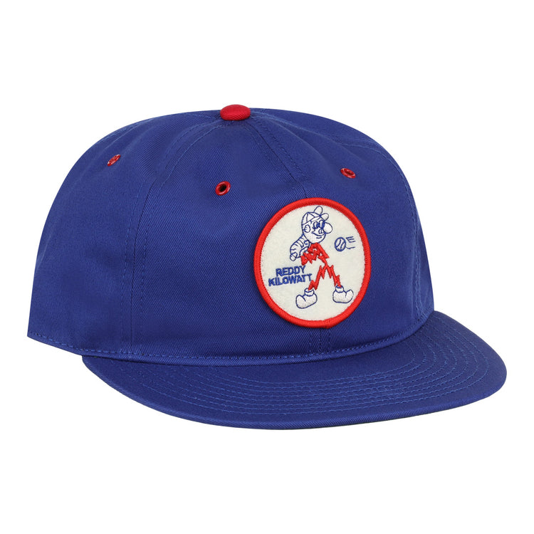 The EFF Reddy Kilowatt Cotton Twill Ballcap is royal blue, featuring a front circular patch with Reddy Kilowatt running with lightning bolts and a red border.