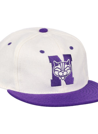 The EFF Northwestern University Vintage Ballcap is a white cap with a purple brim and button, featuring a large purple N with wildcat face embroidery—a classic vintage college baseball hat.