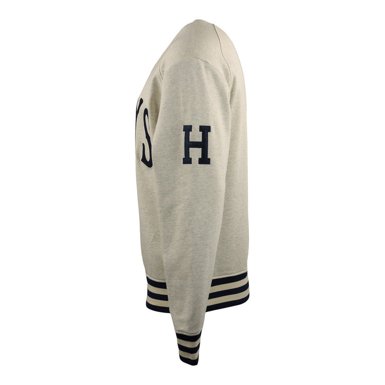 Side view of the EFF Homestead Grays NLB Corduroy Crewneck in light gray, featuring navy stripes on the cuffs and hem, an H on the sleeve, and partial navy lettering honoring Black Baseball teams on the chest.