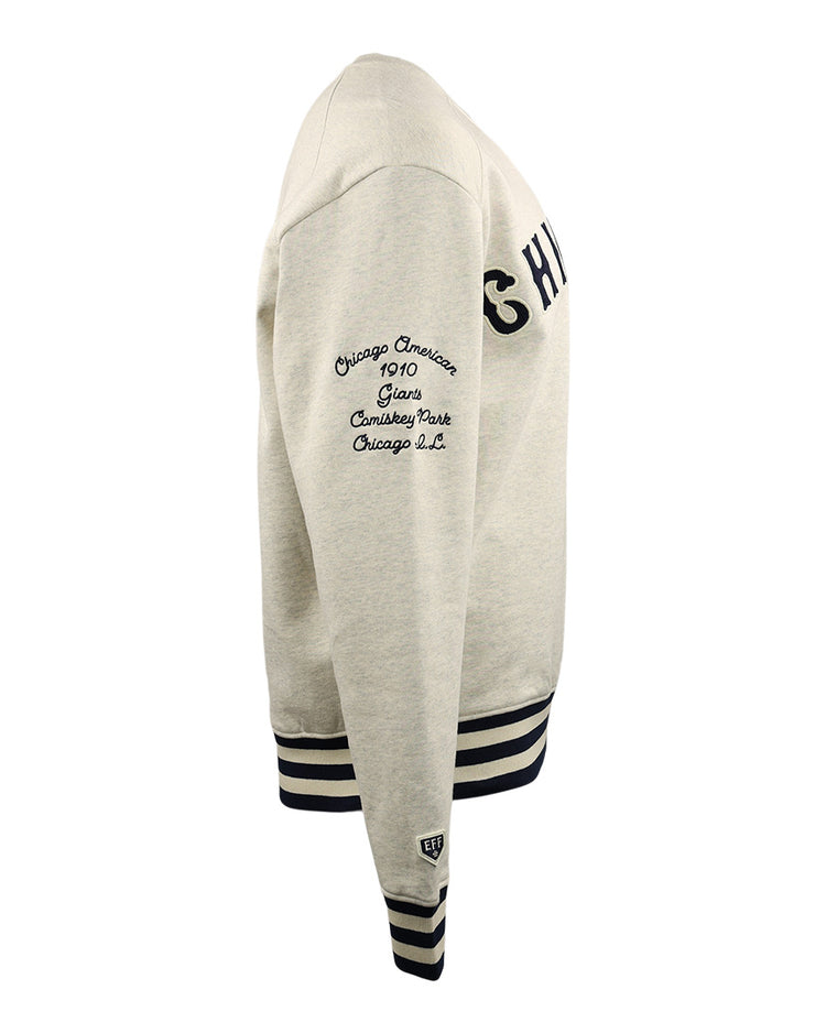 The EFF Chicago American Giants NLB Corduroy Crewneck features light gray corduroy, black striped cuffs and hem, CHICAGO on the chest, and an embroidered sleeve honoring the 1910 Negro Leagues team at Comiskey Park.
