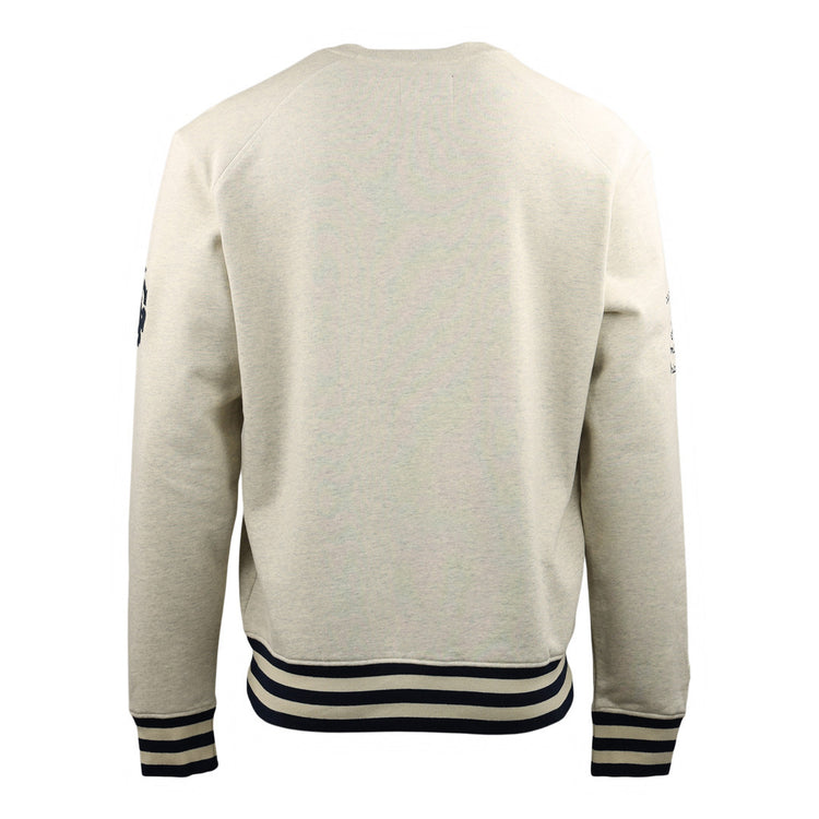 Back view of the EFF Chicago American Giants NLB Corduroy Crewneck in cream, featuring black and white striped cuffs and waistband. This long-sleeve sweatshirt honors historic Black baseball teams with its minimal detailing.