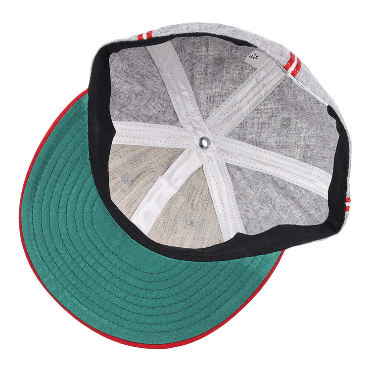 A top-down view of the Ebbets Field Flannels Daytona Beach Islanders 1936 Vintage Ballcap shows a gray cap with a green underside brim, red and white striped edges, and visible inner stitching and fabric panels.
