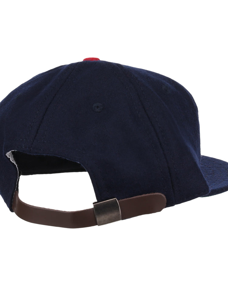 The EFF Tulsa Oilers 1969 Vintage Ballcap is a navy blue cap seen from the back, featuring a brown adjustable strap with a metallic clasp, inspired by the original Pacific Coast League design.