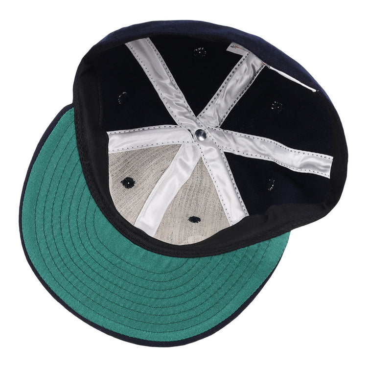 The EFF Tulsa Oilers 1969 Vintage Ballcap features a green underbrim, silver lining, stitched panels, and ventilation holes reminiscent of the classic Pacific Coast League style.
