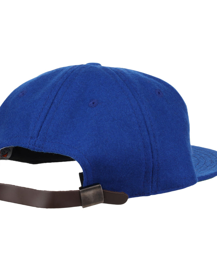An authentic EFF Oklahoma City 89ers 1994 Vintage Ballcap in blue, viewed from the back, with a brown adjustable leather strap and metal clasp.