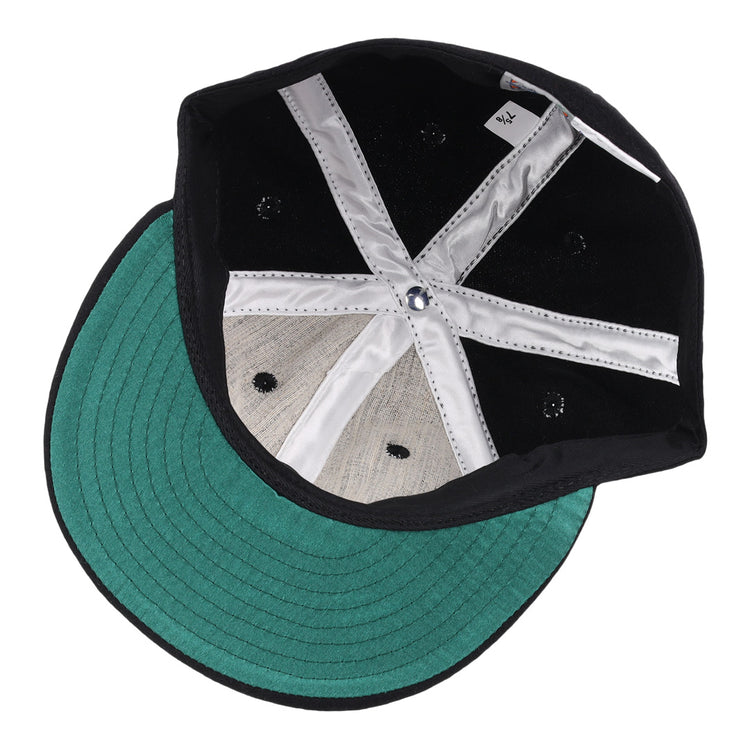 The image displays the inside of the Jackson Generals 1953 Vintage Ballcap by EFF, featuring a green visor, stitched panels, and a satin-lined sweatband.