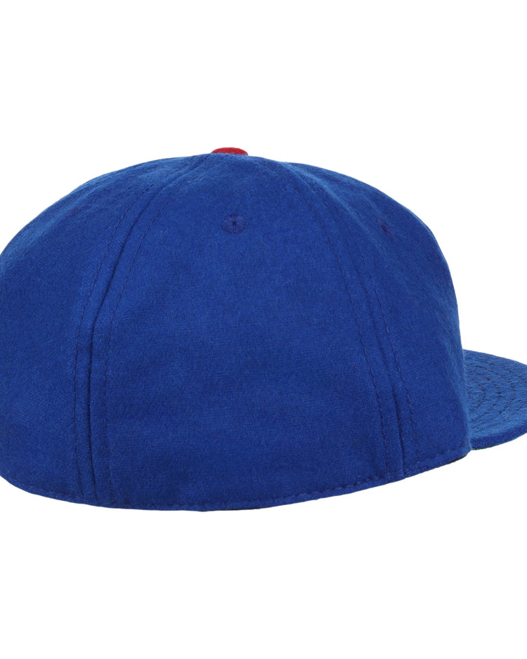The EFF Wichita Aeros 1972 Vintage Ballcap features blue fabric, a red top button, visible seam stitching, and is an authentic reproduction of the classic design.