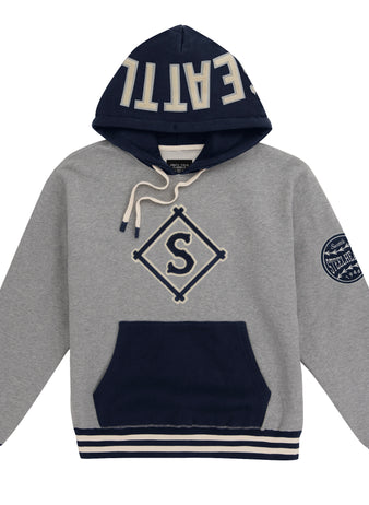The EFF Seattle Steelheads Vintage Inspired NLB Colorblock Hoodie features a gray and navy design, large diamond S on the front, SEATTLE on the hood, Negro League team sleeve patches, striped cuffs and hem, and white drawstrings.