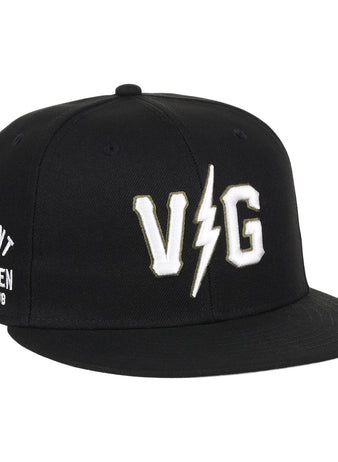 The EFF Violent Gentlemen x EFF Collection Fitted Ballcap is black with bold white VG letters split by a lightning bolt on the front and Violent Gentlemen Hockey Club on the side, part of the exclusive hockey apparel collection.